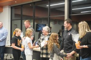 Page students present tokens of appreciation to TK board of education members.