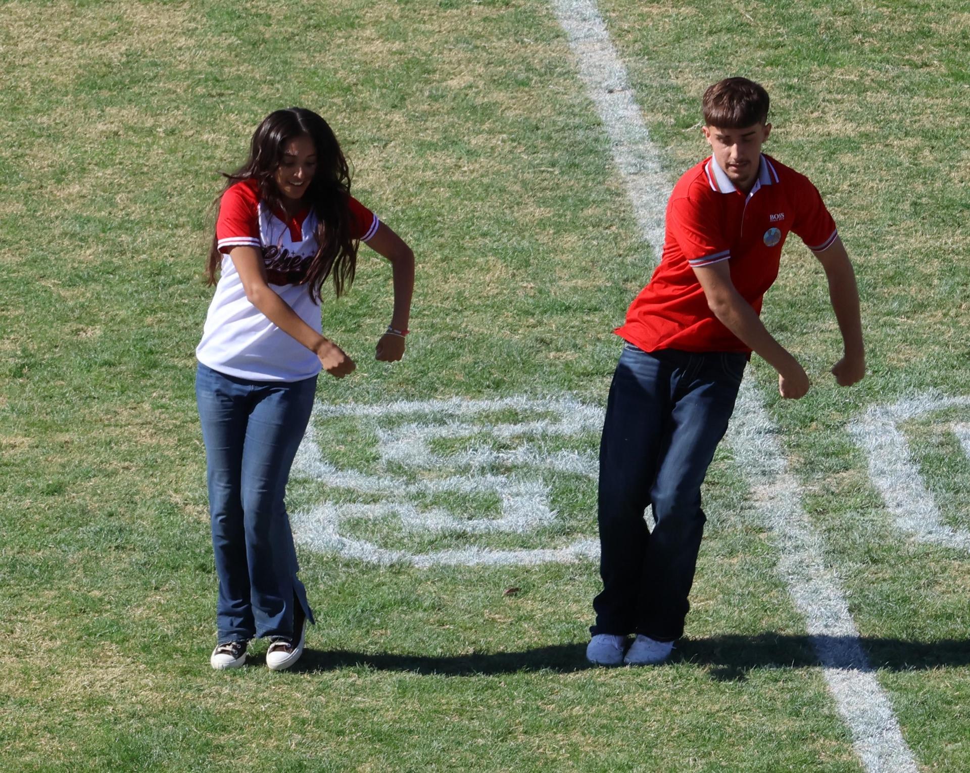 students and staff at the homecoming rally