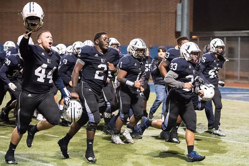 UCHS Soaring Eagles Varsity Football Team rejoicing their win