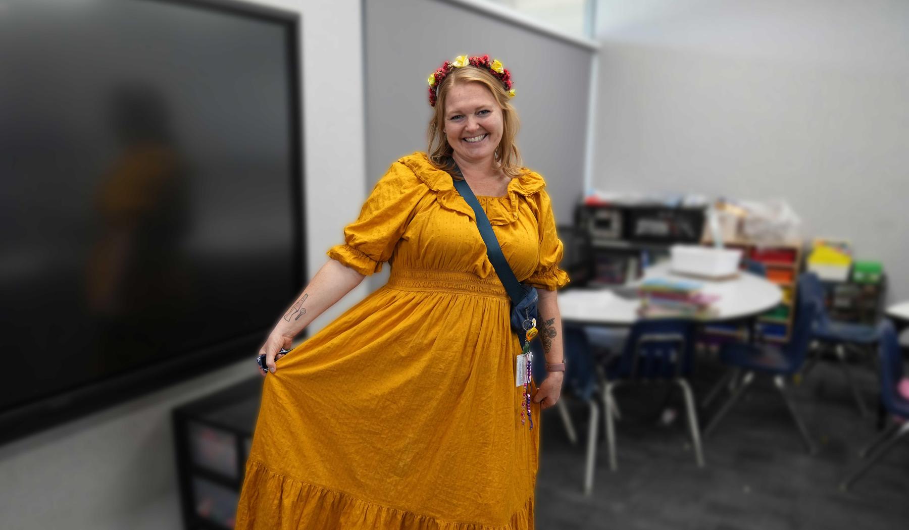 staff member in bright yellow dress
