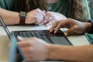 Someone using a laptop