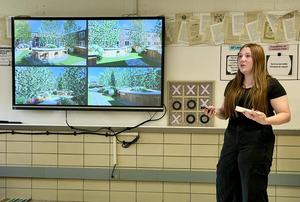 A student presents designs for a garden space with multiple visuals displayed on the screen.
