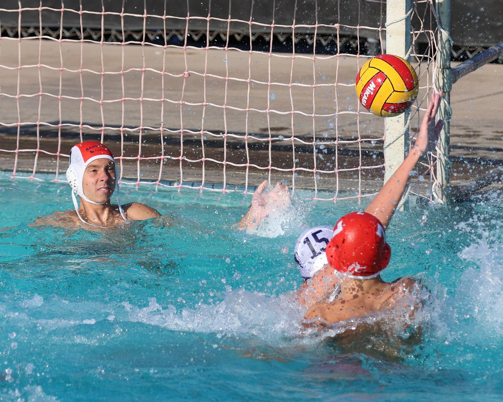 Boys playing water polo against Yosemite