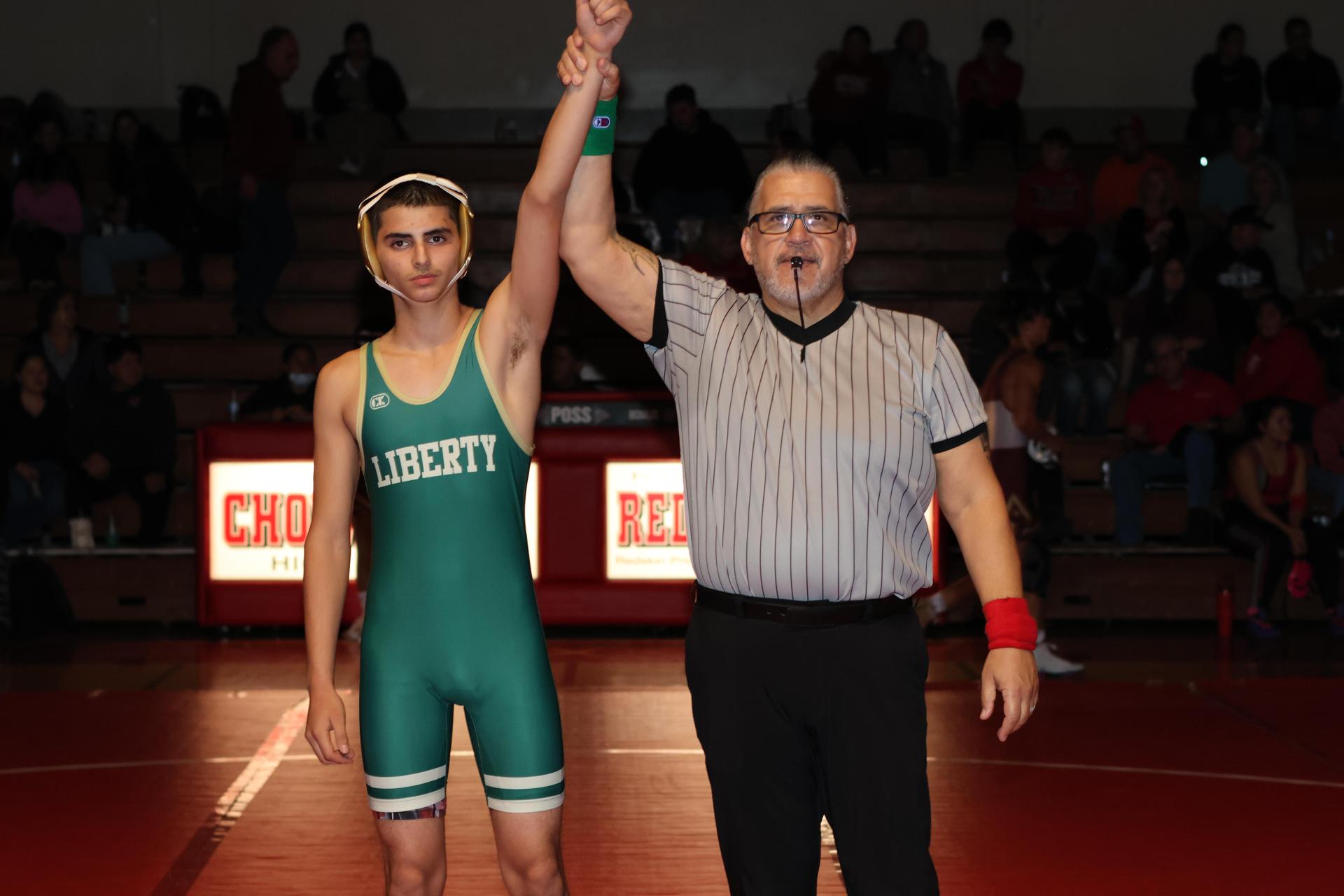 Wrestling winners with hands up 64