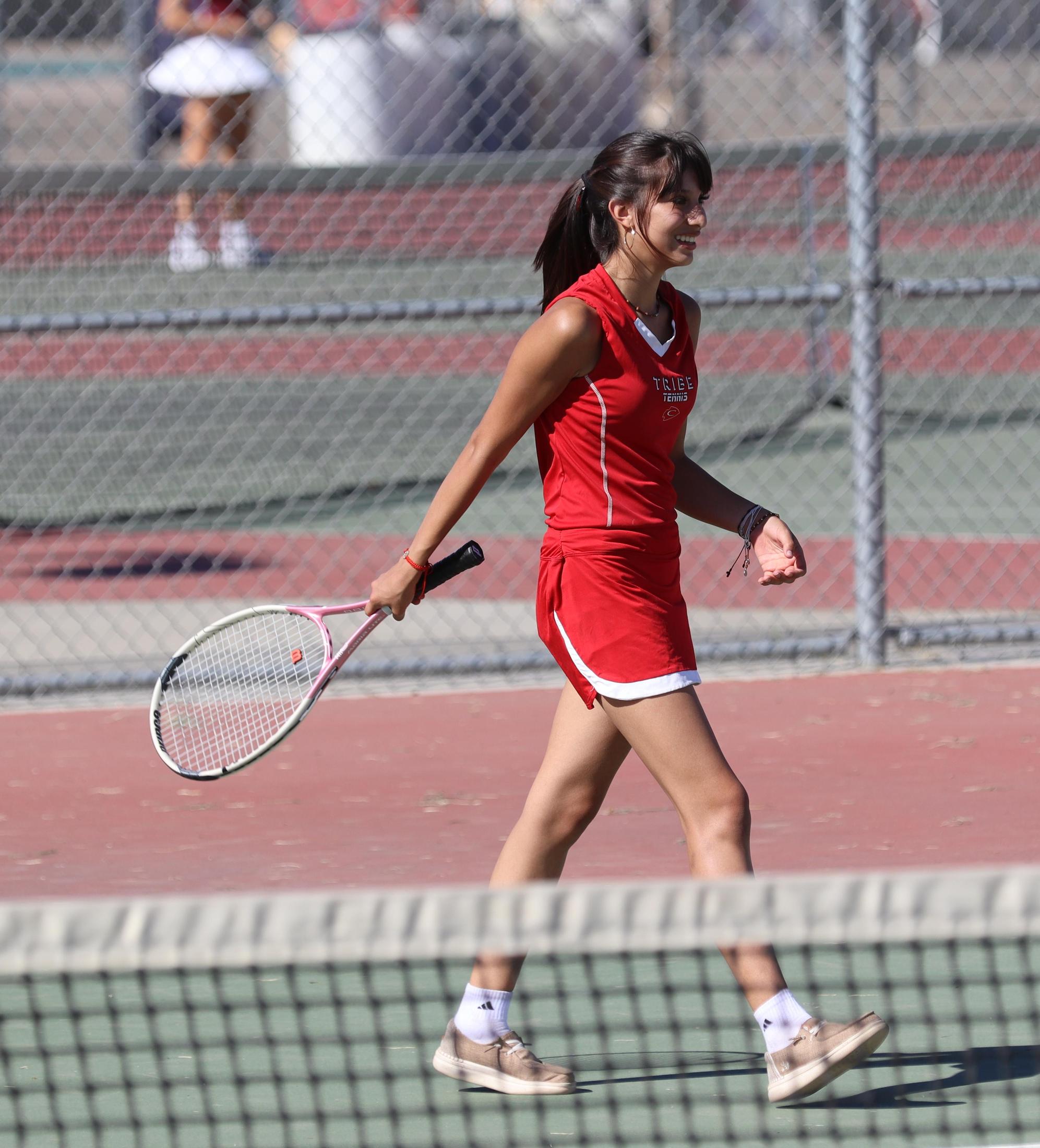 girls playing tennis against Golden Valley