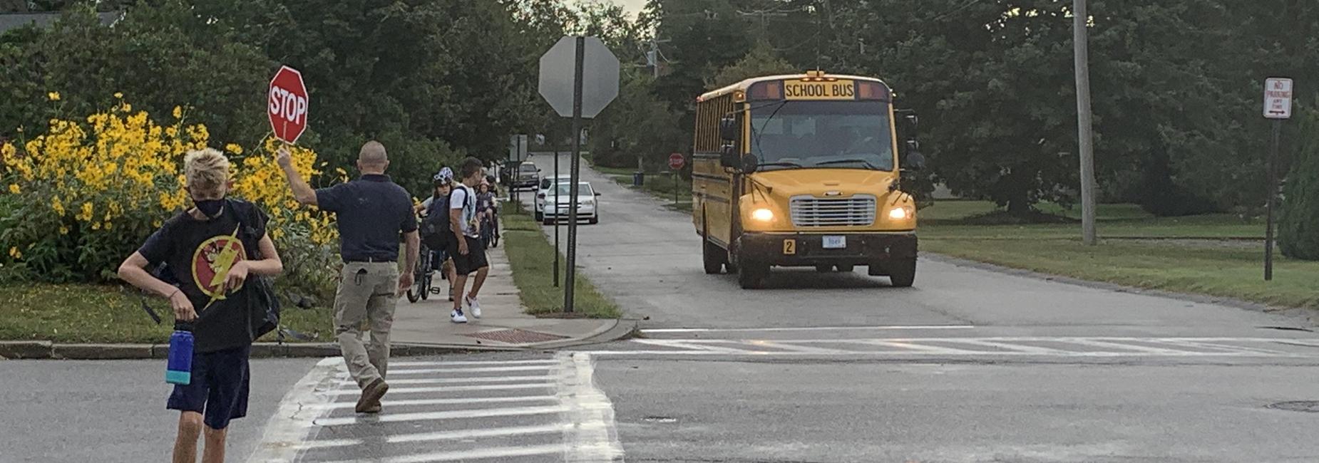 school bus and crossing guard
