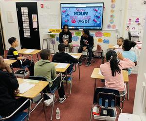 BHS Student sitting with Davis students