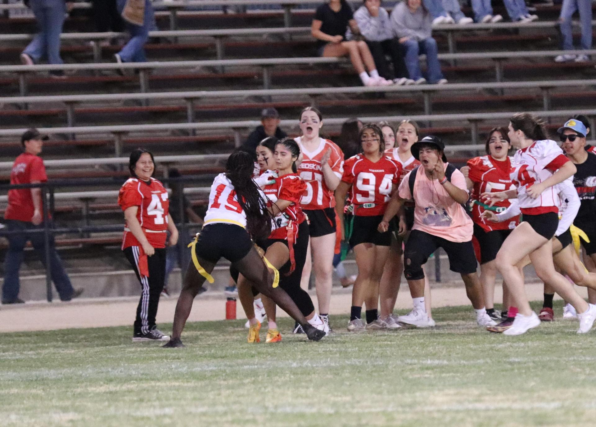 girls playing flag football