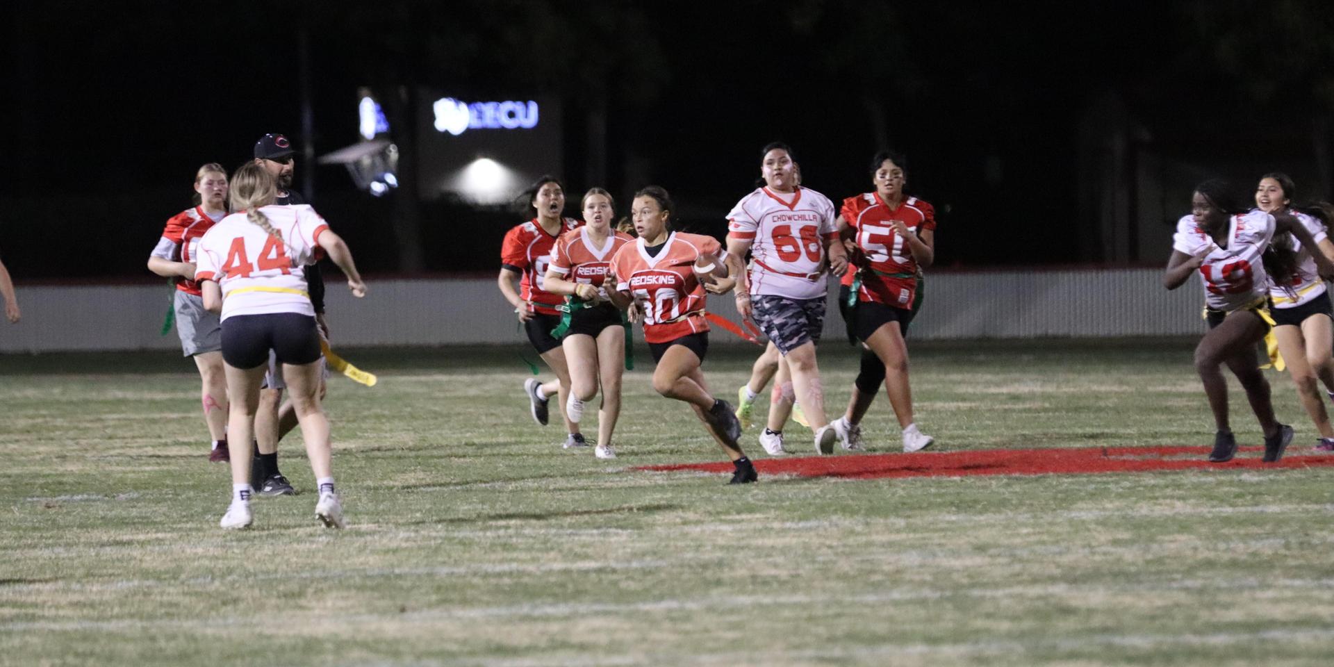 girls playing flag football