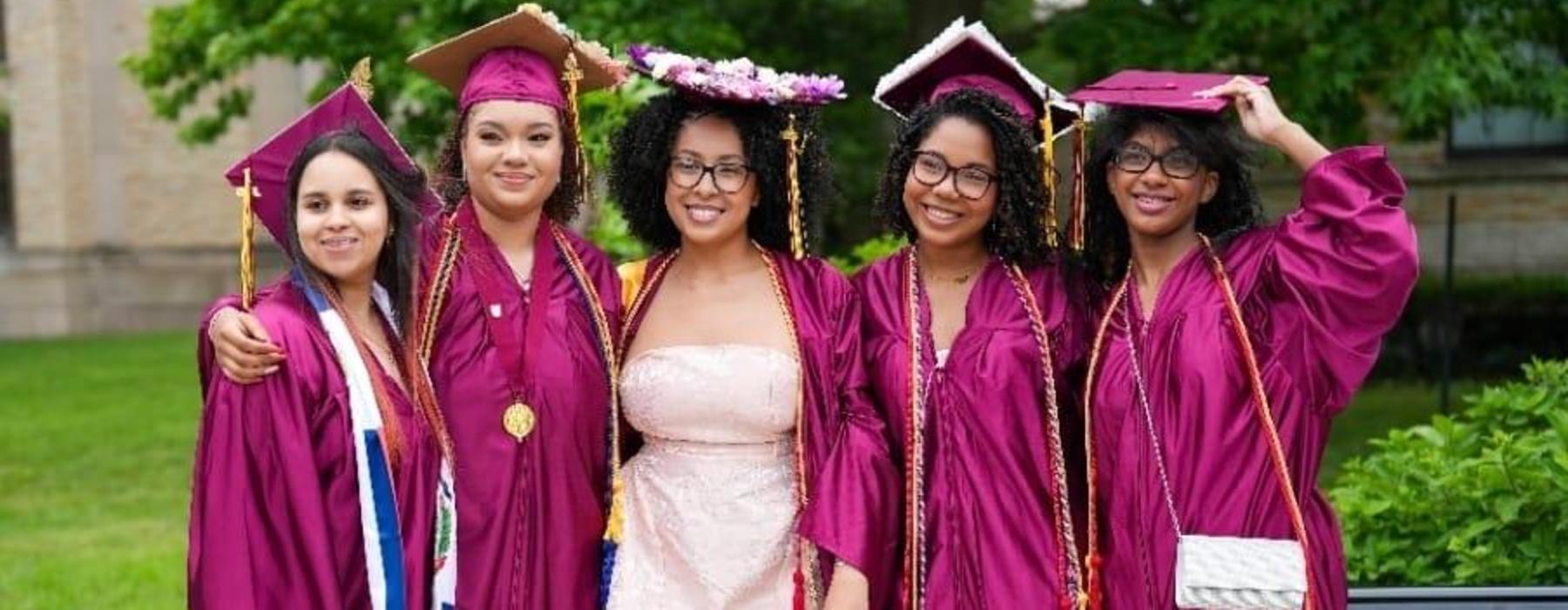 Group photo of female students at graduation.