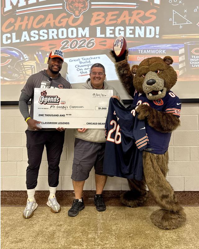 Chicago Bears Classroom Legend Mike Doody poses with former player Christian Jones and mascot Staley Da Bear.