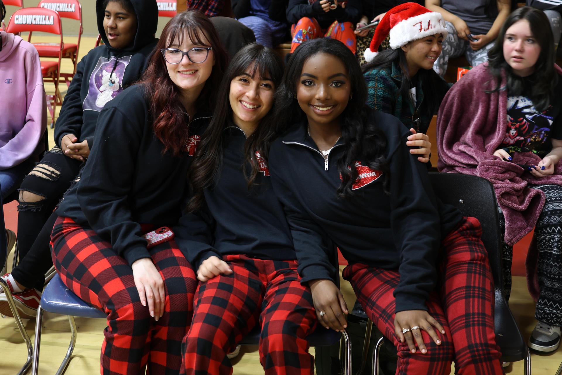 students and staff posing at the winter wishes rally