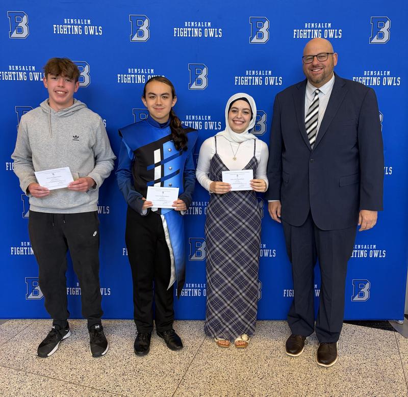 Image of 3 commended students and their principal