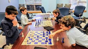 boys competing at chess