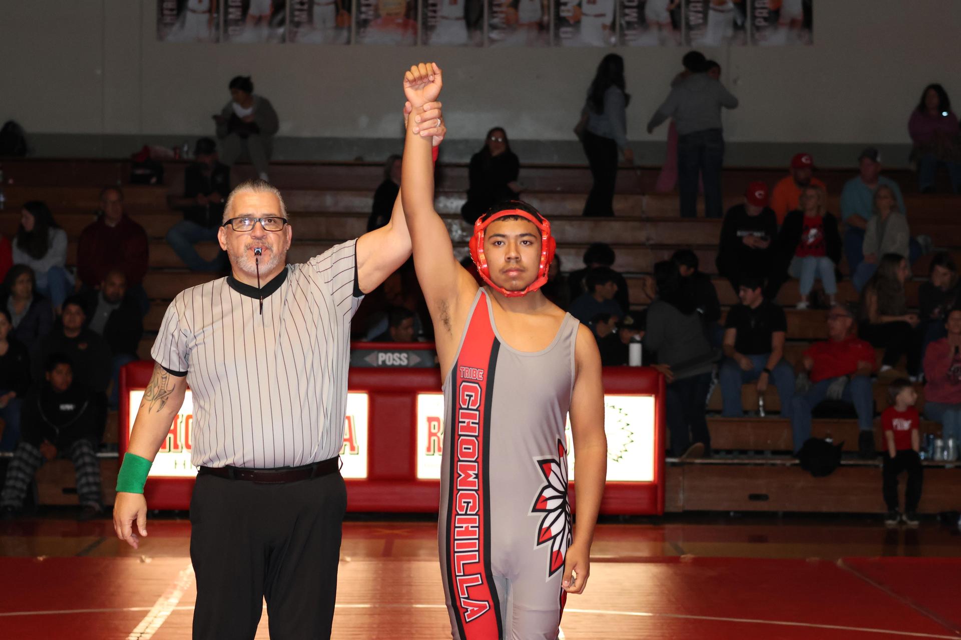 Wrestling winners with hands up 41