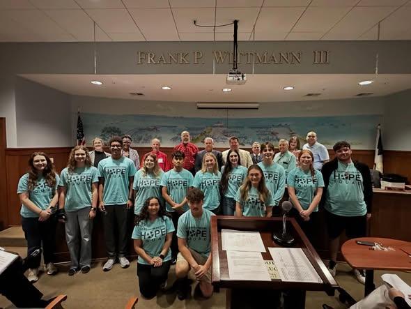 The high school students successfully formed a partnership with the city to issue a proclamation designating February 8-13 as “Hope Week” in Pass Christian.