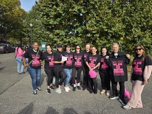 staff wearing breast cancer shirts