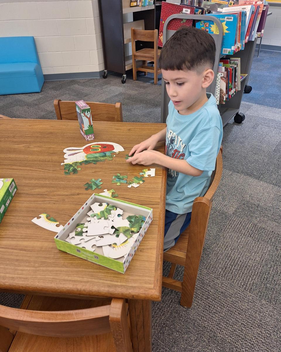 Eric completing a puzzle solo.