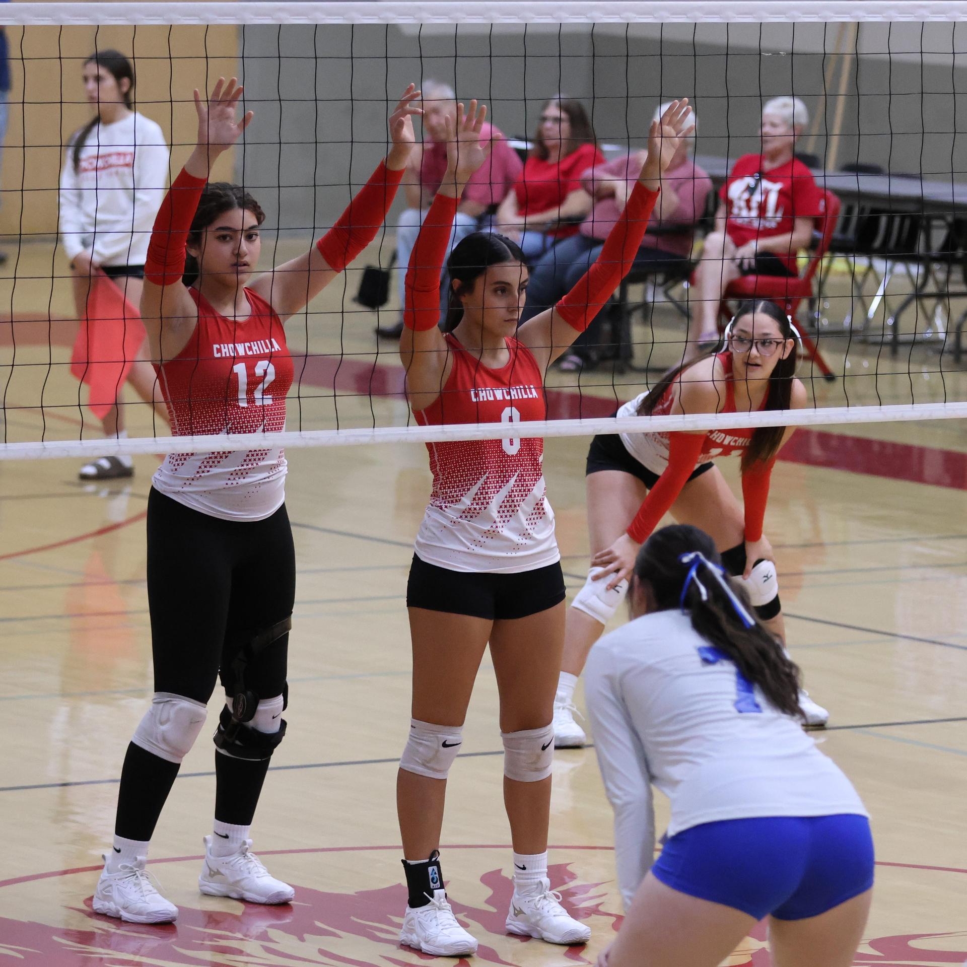 Varsity girls Volleyball playing vs. Madera 47