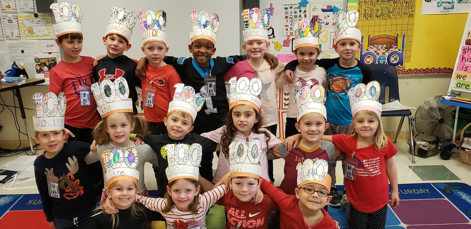 Students wearing 100th day hats