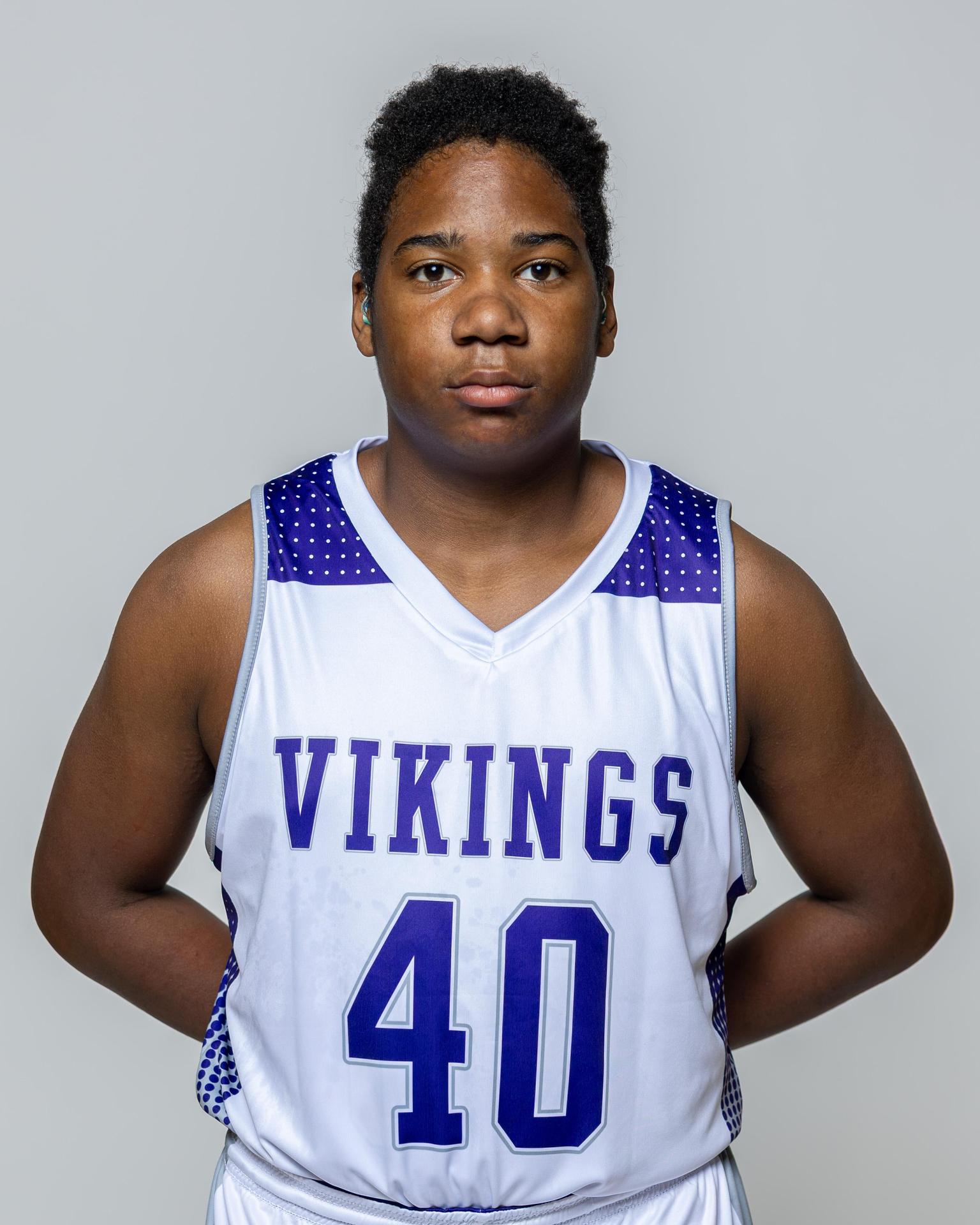 Male player number 40 posing with serious stature for a picture