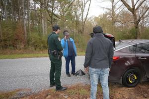 A Pike County Sheriff’s Office deputy stopped to assist Pike County citizens who were changing a flat tire