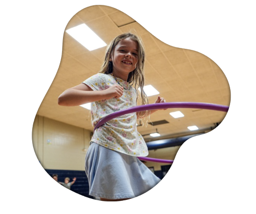 Photo of a young girl hoola-hooping