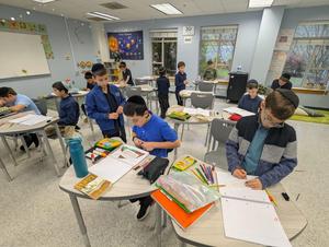 Fourth grade students work on highlighting different steps in a short story.