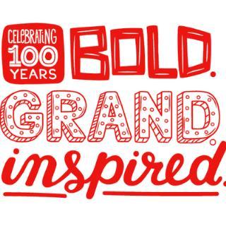 Text celebrating 100 years with bold, colorful phrases: bold, grand, inspired.