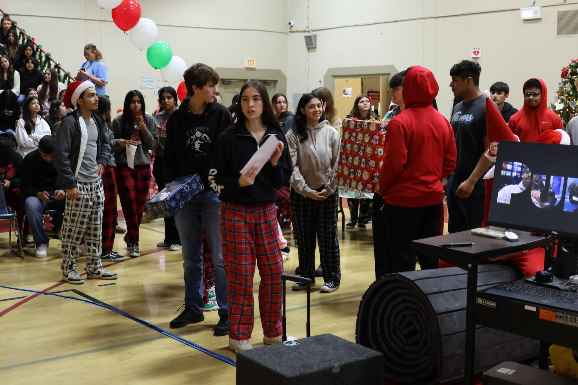 students receiving gifts
