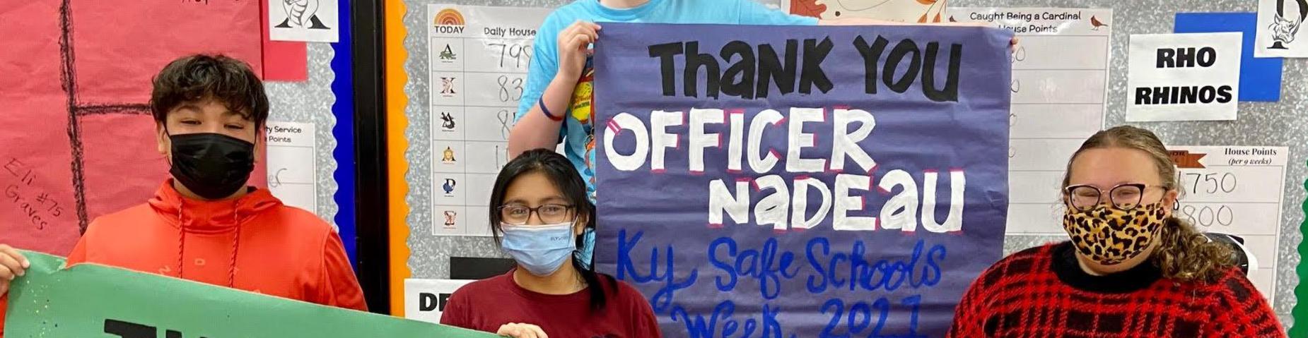 students thanking officer Nadeau for speaking to them about safe schools.