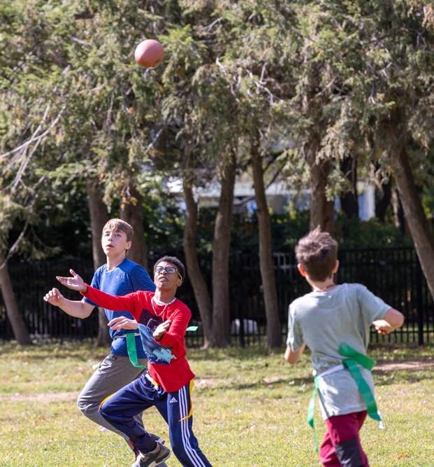 Middle School Students playing flag football. Sports, sportsmanship