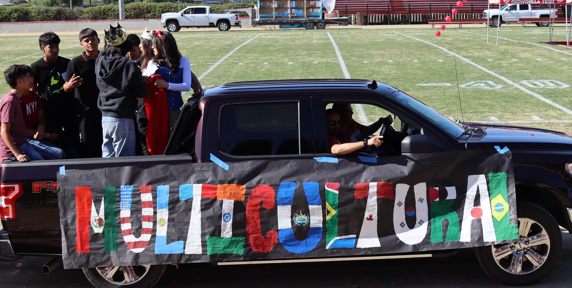 students and staff at the homecoming rally