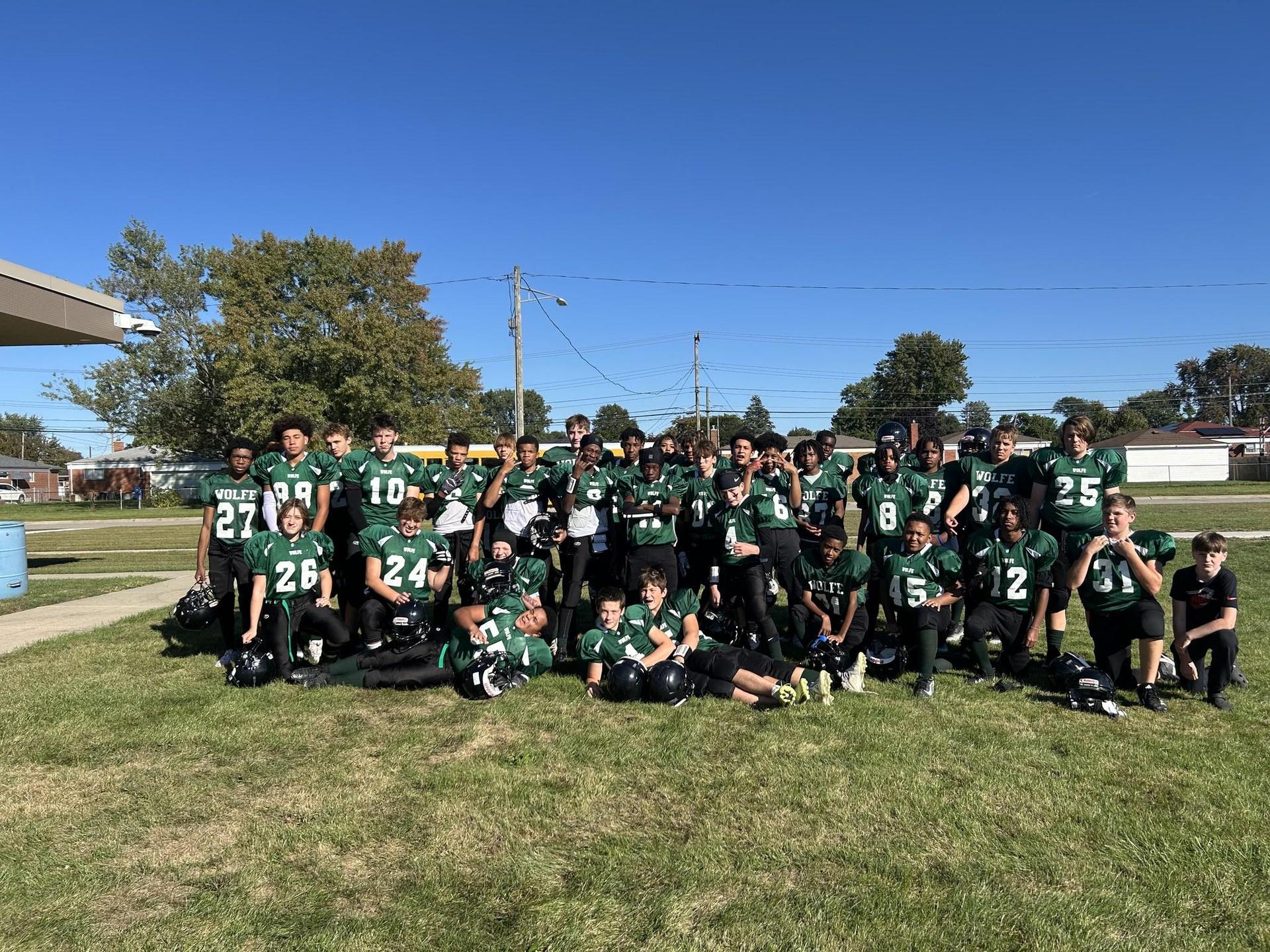 Wolfe Football Team posing for a group photo