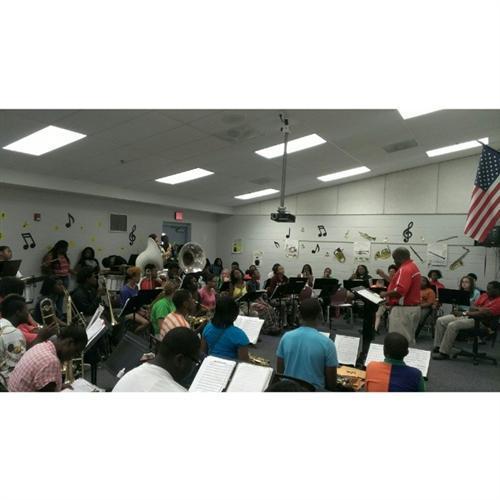 Former Director of Bands, Mr. John Greene Directing the McCormick Concert Band In Rehearsal Former Director of Bands, Mr. John Greene Directing the McCormick Concert Band In Rehearsal