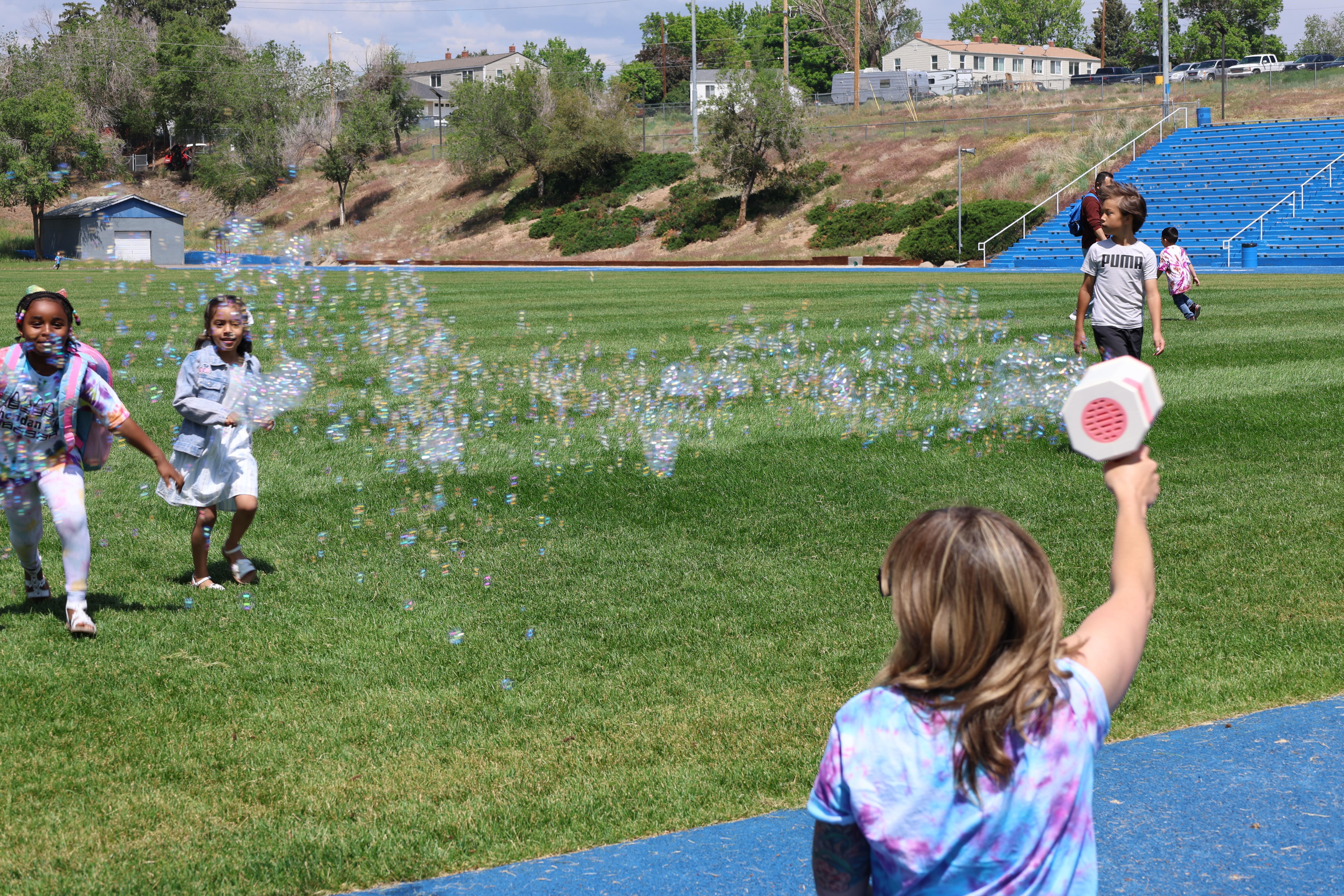 Children playing with bubbles