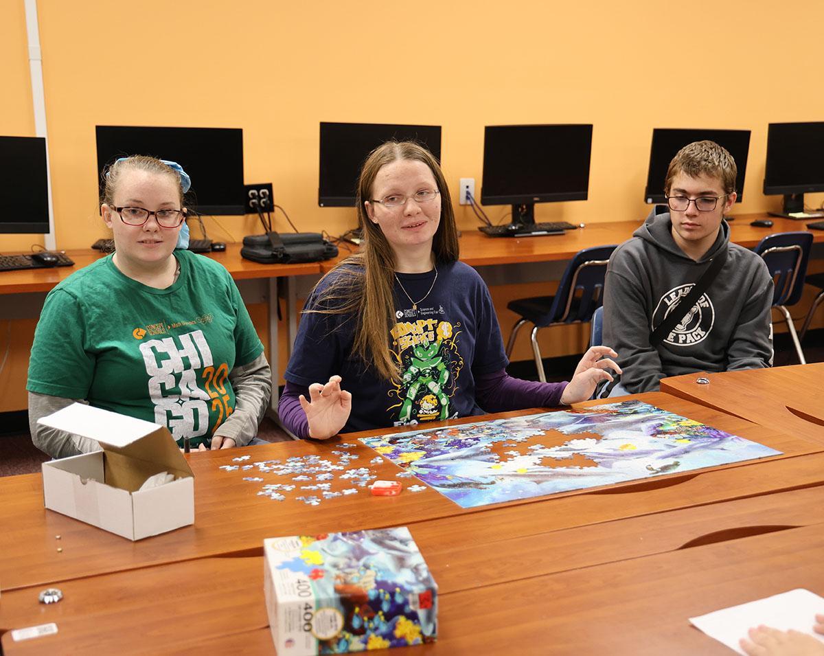 HSA Toledo students enjoying a puzzle
