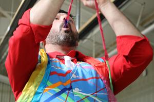 Magician in colorful clothing