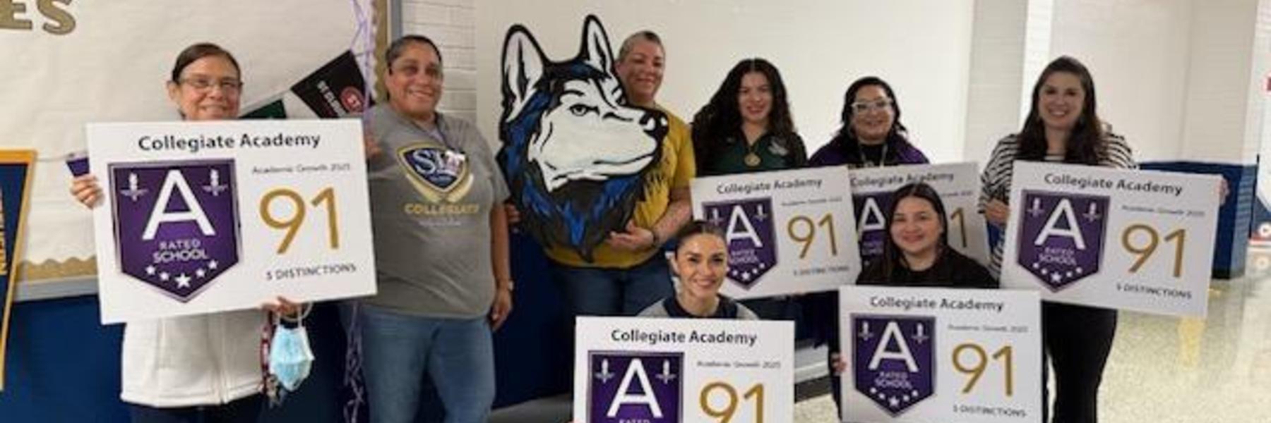 Collegiate Academy staff celebrating  "A" rating campus achievement.