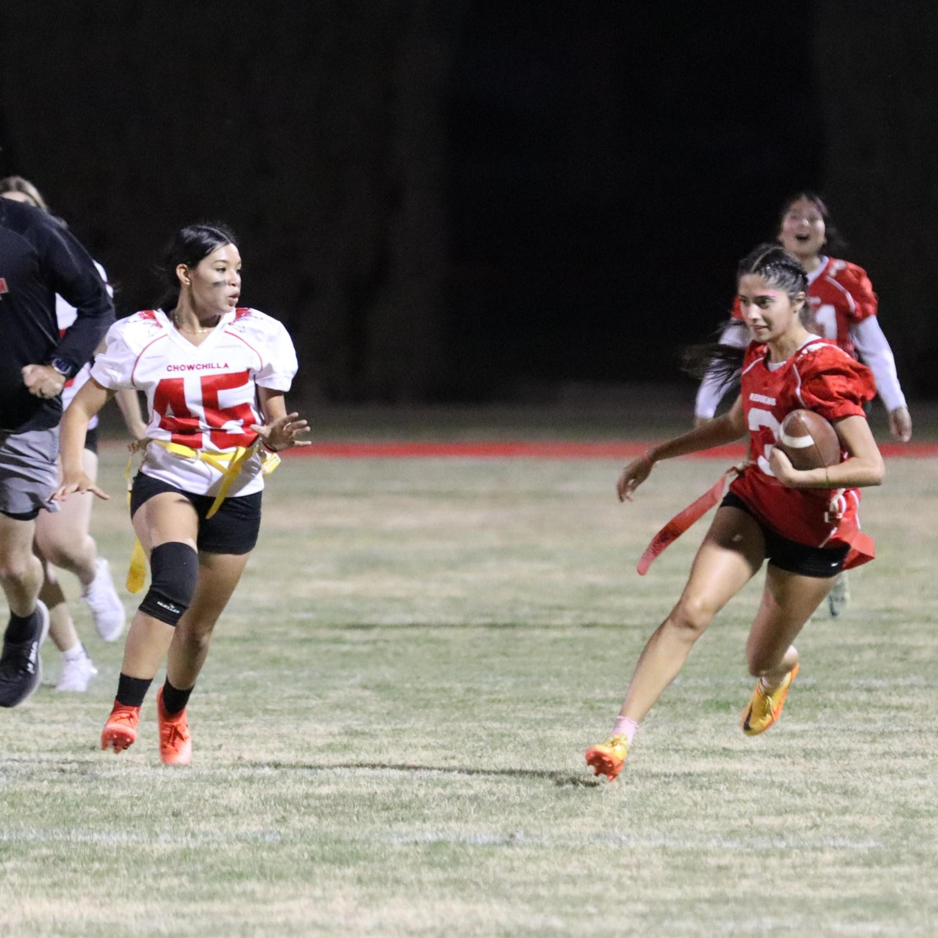 girls playing flag football