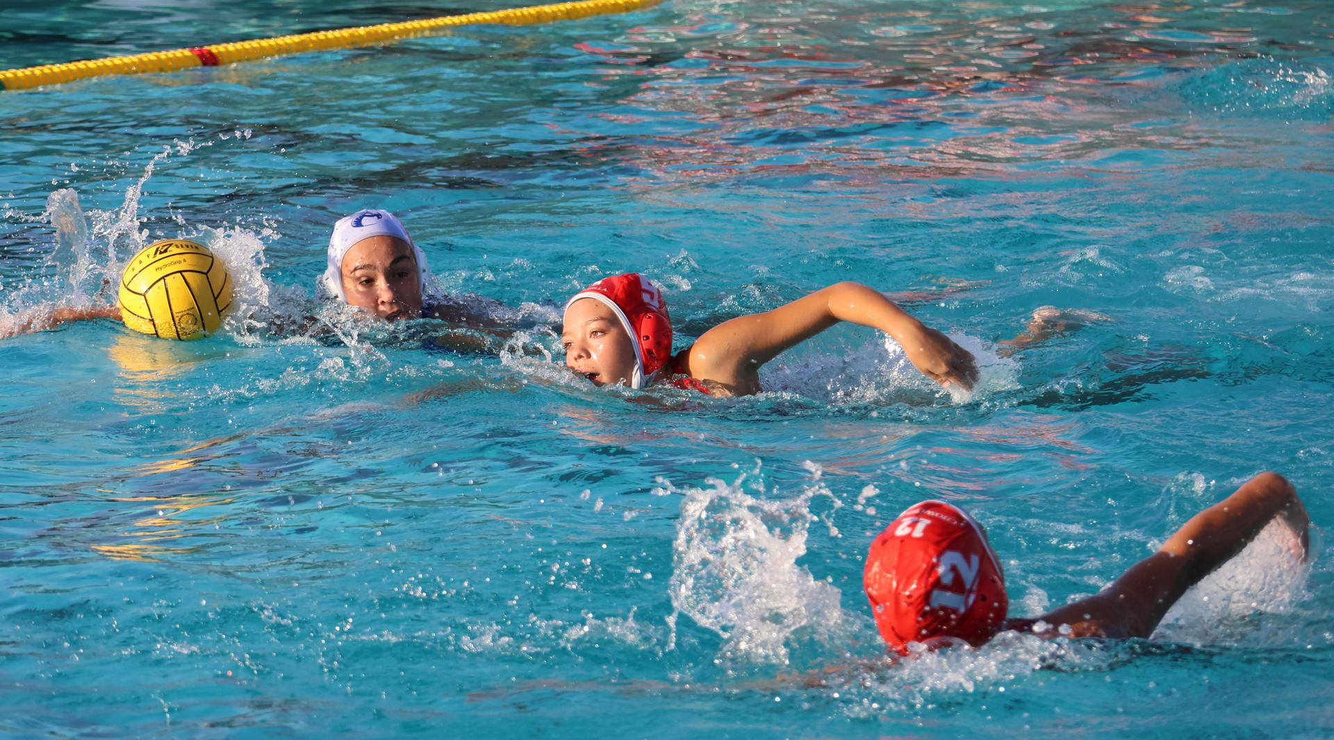 girls playing water polo against Sanger West