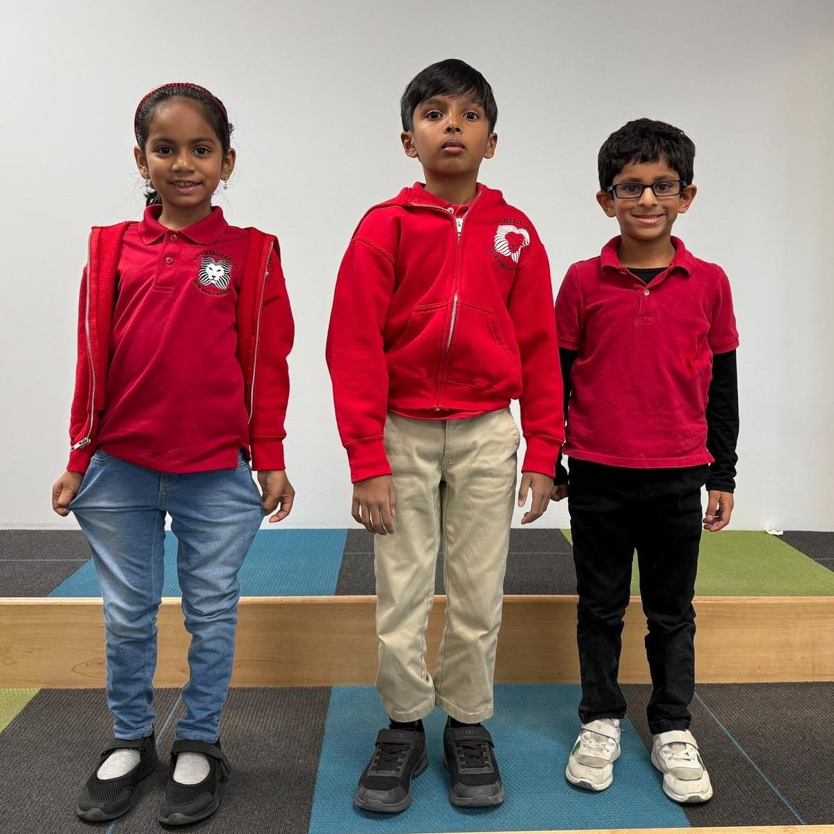 Students stand in the library