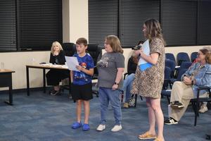 Harrison Bausell gives a speech to the board about his new student-led group.