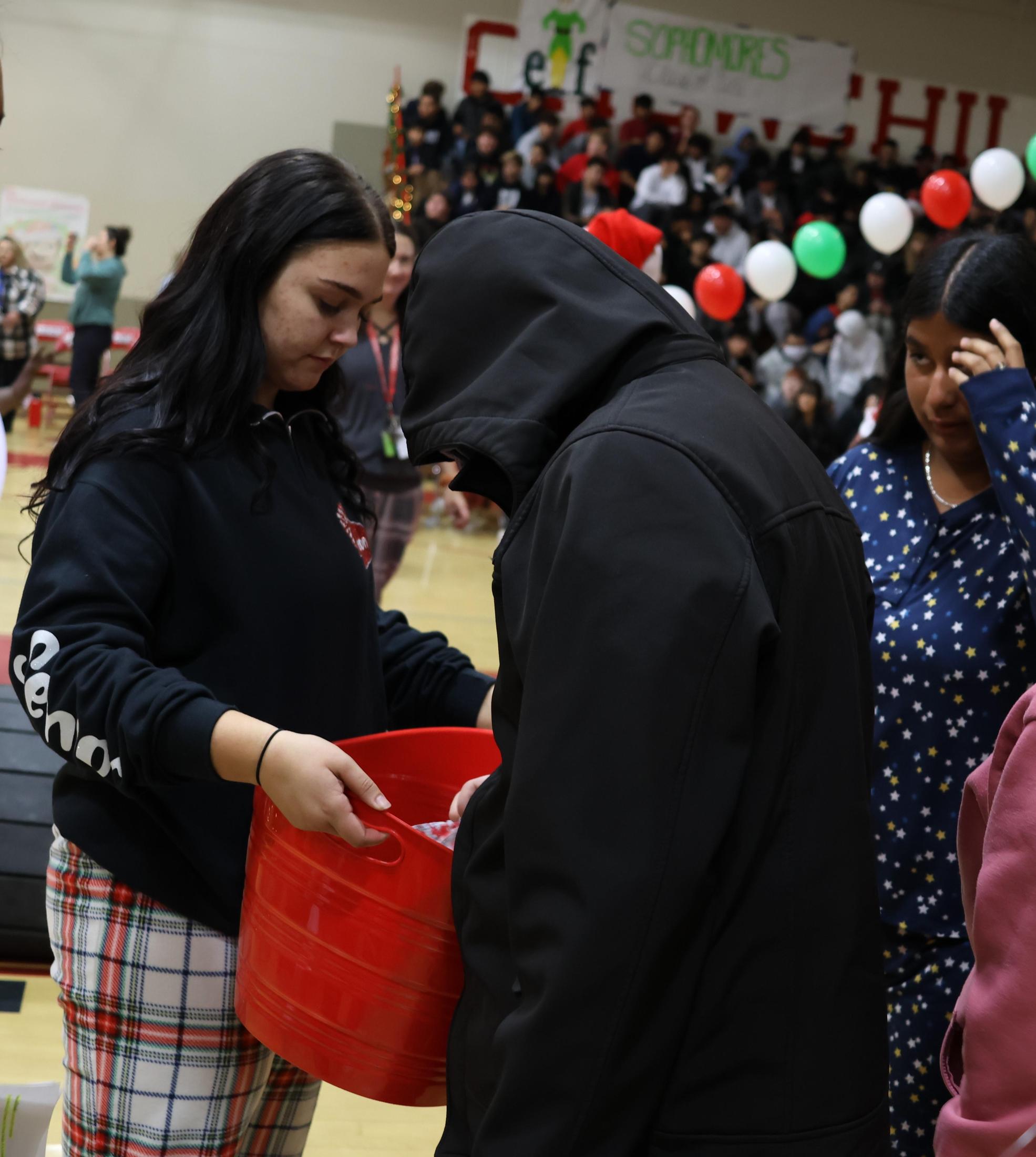 students receiving gifts