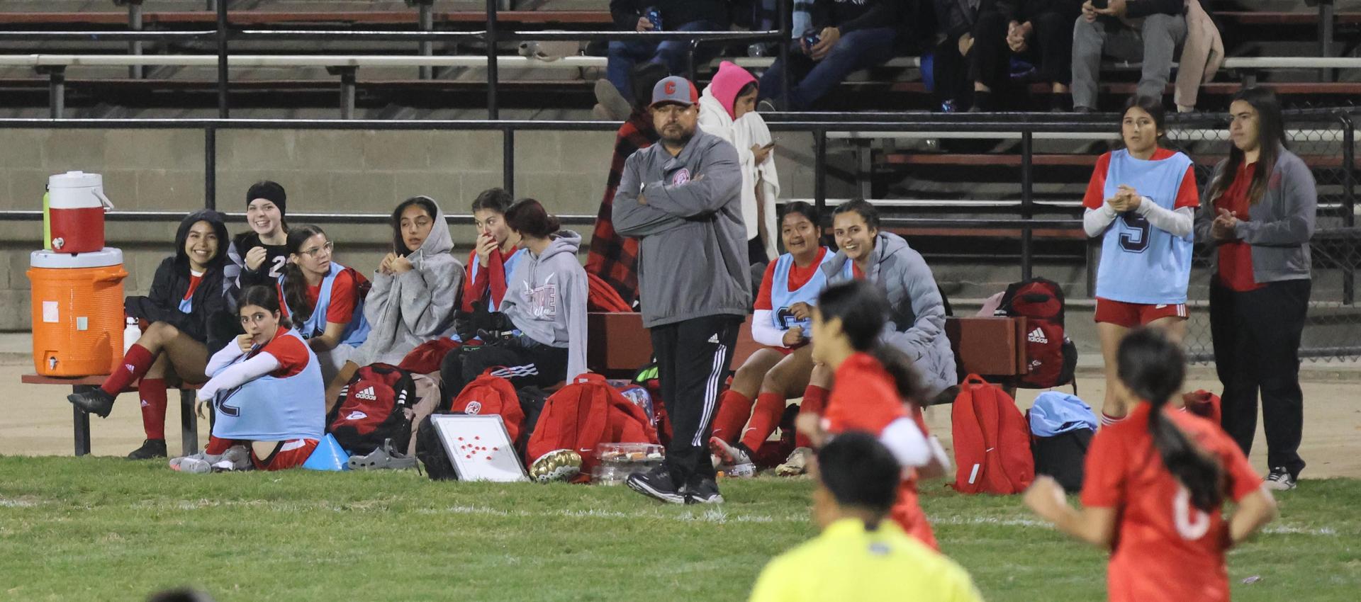 Varsity girls playing soccer against sunnyside