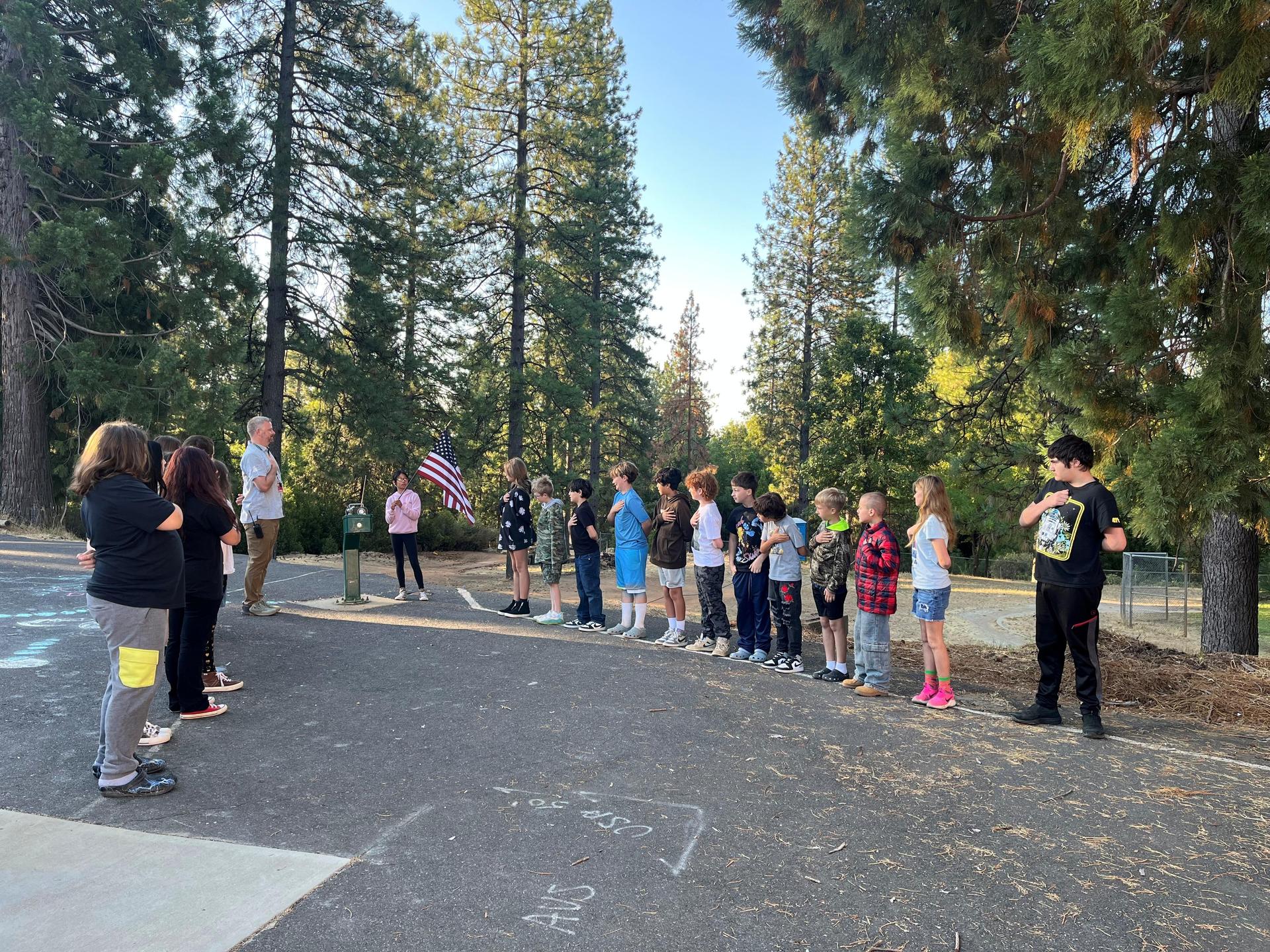 students saluted the flag outside