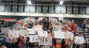 Page and Lee elementary students made signs to cheer on the Unified Basketball team.