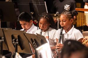 Multiple band members perform