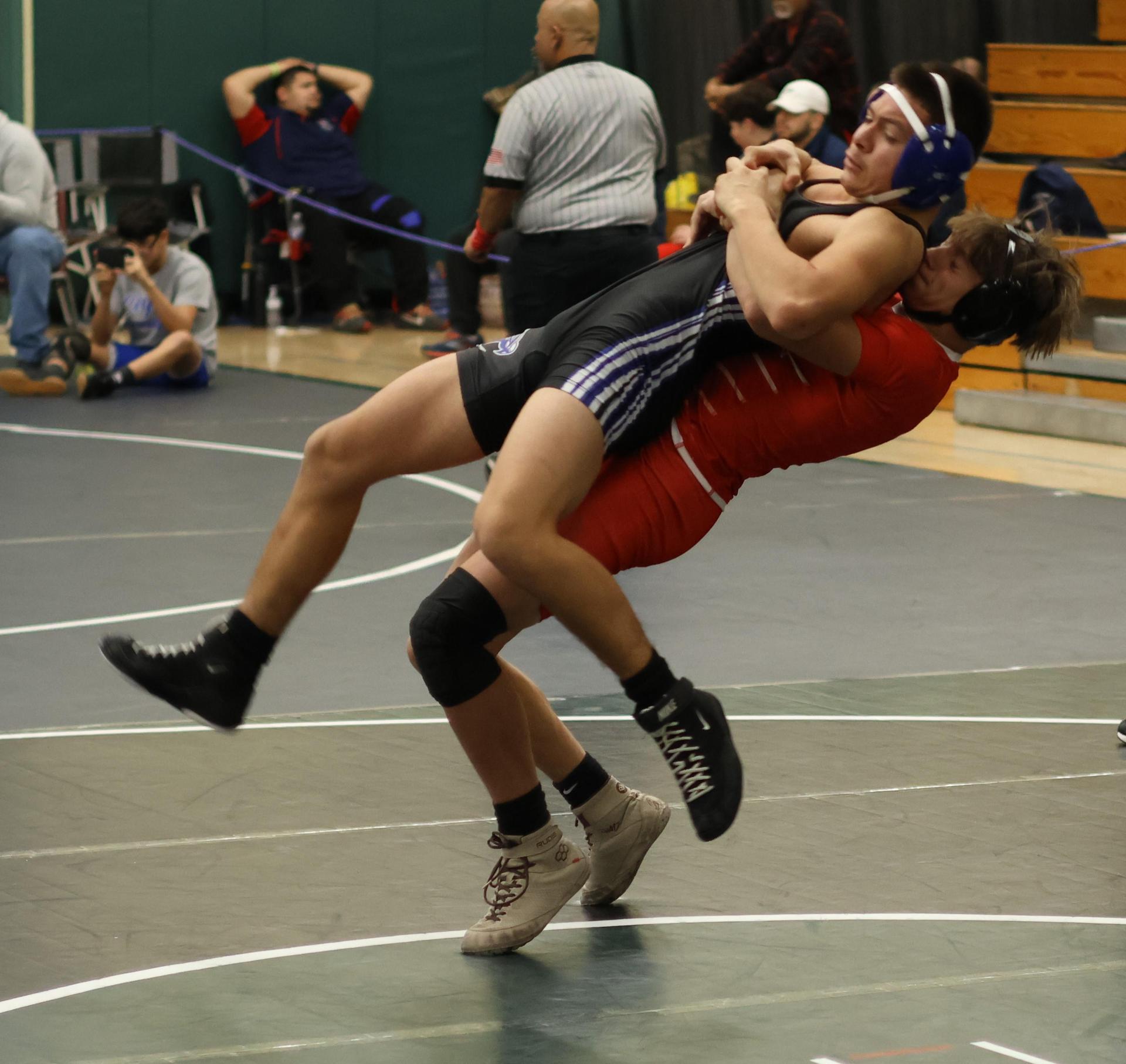 Boys wrestling in the Liberty Duals event 110
