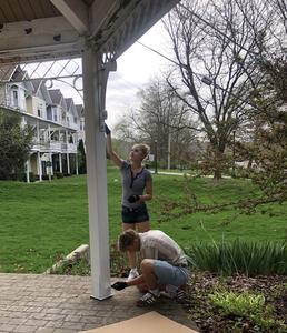 Students paint the gazebo in Middleville.